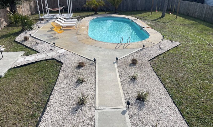 Pretty Bayou House | Private Bungalow with pool across the street from bay! 5 min drive to the beach.