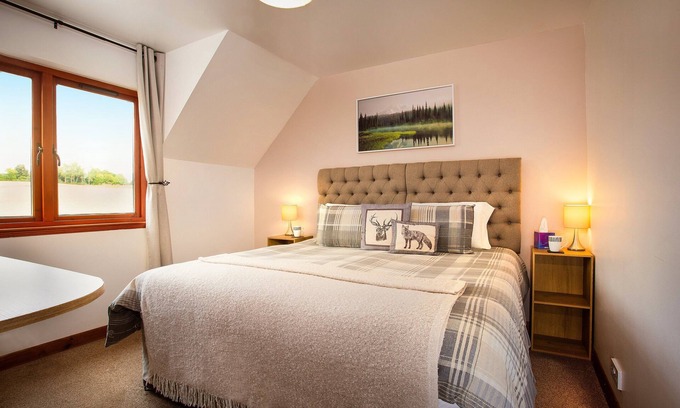 Alness Bed & Breakfast | Private En-Suite Room with calming views over barley fields and forests beyond.