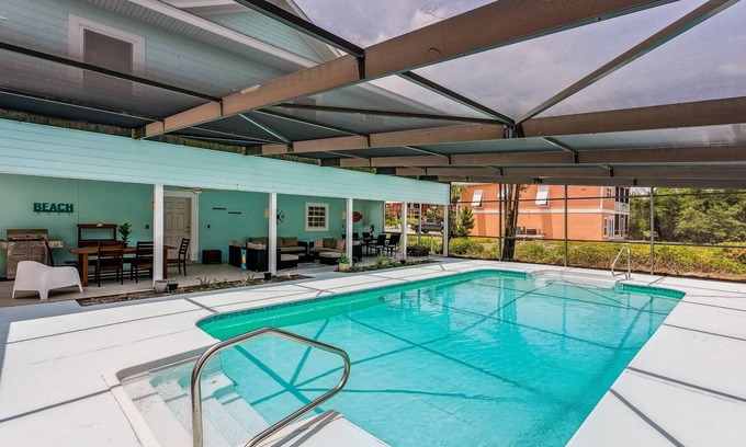 Ono Island House | Private Saltwater Heated Pool |Walk to Johnson Beach |Single Level |Screened Lanai |8 Bikes|Dogs Ok