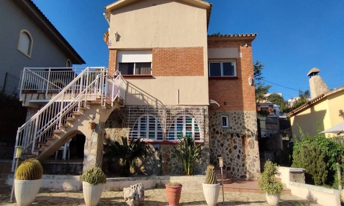 Santa Susanna Ski Chalet | Quiet Escape with Stunning Sea Views