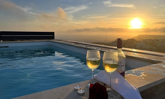 Ta' Pennellu Apartment | Relax and unwind at this one-of-a-kind luxury penthouse, where breathtaking sea views and a private rooftop pool set the stage for an unforgettable holiday.