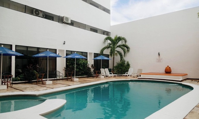 Merida Municipality Hotel | Relax at a Poolside Hotel in Mérida’s Centro District Near Dining & Local Market