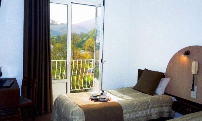 Lourdes Hotel | Relax in Comfort, Pet-Friendly, Free Parking, Onsite Restaurant, Scenic Views!
