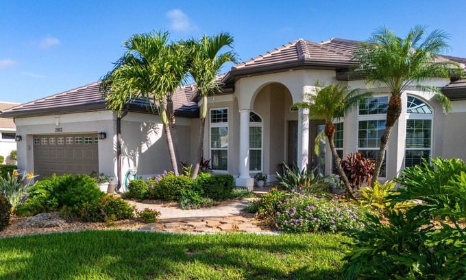 Pelican House | Relax & Unwind: Family Friendly Home with Private Heated Pool and Canal Views!
