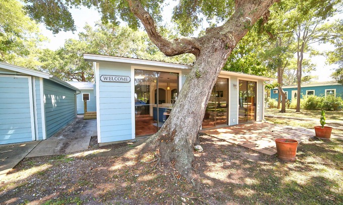 Cedar Lane House | Relaxing Caney Creek views or just minutes from the beach!