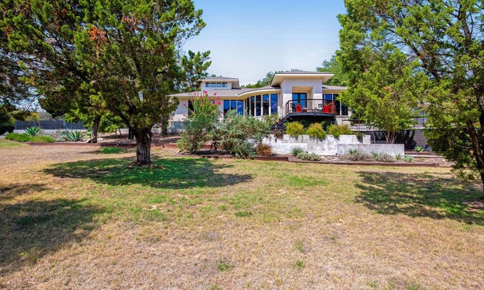 Barton Bend House | Remarkable villa with private pool, patio, game room, fireplace & gorgeous views