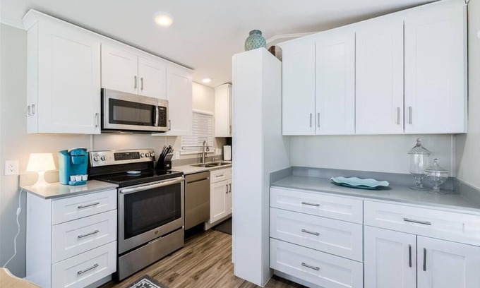 Carriage Manor House | Resort Living in this fully remodeled park home in Carriage Manor