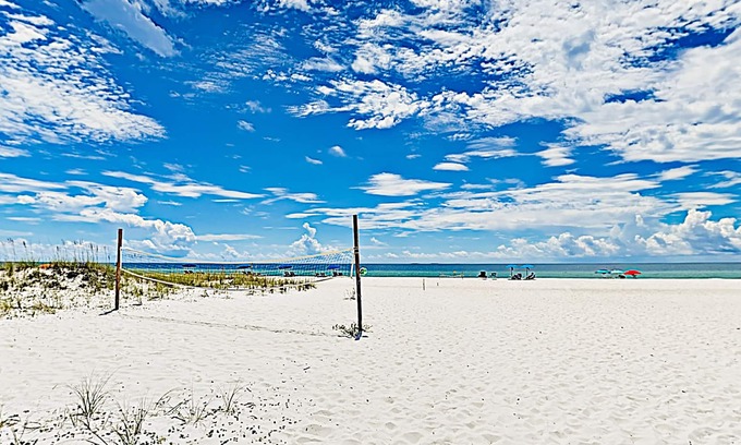 Ono Island Condo | Resort-style beachfront condo with Gulf view, beach access, docks & pools