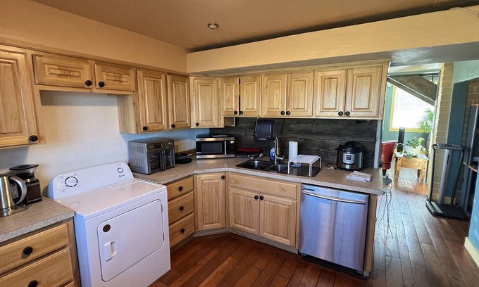 Umatilla House | RIVER LODGE- This property has shared living space and perfect for business stay