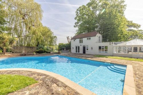 Windsor House | Riverside Gem, 2 Homes, Heated Pool, Hot Tub & Sauna