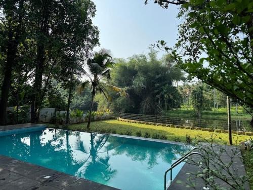 Denkanikota House | Riverside Private Pool Villa in Kochi - Ohstayz Whispering Grove