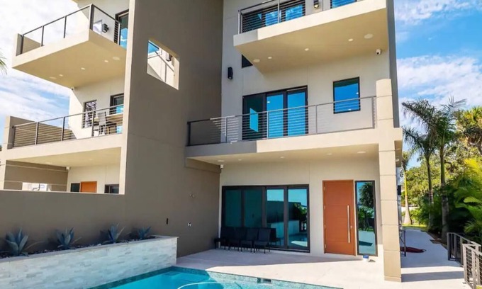 Melbourne House | Riverview Retreat- Riverfront Paradise with Dock & Private Pool
