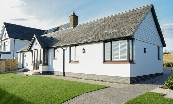South Charlton Cottage | ROCK LODGE, pet friendly, with open fire in Alnmouth