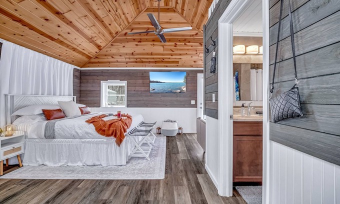 Montague Cottage | Romantic cottage, Lake MI access, wi-fi, king bed, solo stove, sunset views
