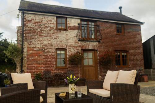 Llangadog House | Romantic Country Cottage with log burner, garden patio, outdoor tub and country views- Brecon Beacons National Park