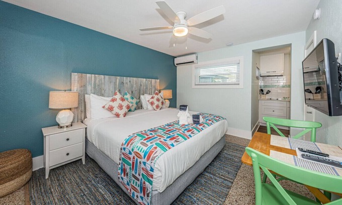 Sunset Beach Hotel | Room 10 · Renovated Boutique Hotel room with a Pool and dock