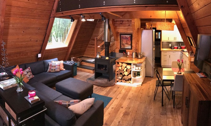 Glacier Cabin | Rustic 70's A-Frame with a cozy modern interior.