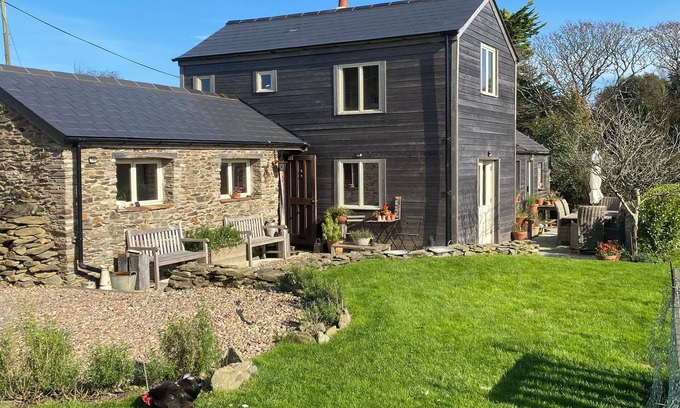 Portloe Cottage | Rustic cottage close to the coast with sea views. Dog friendly, large garden.