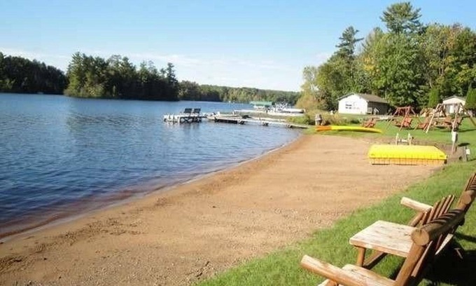 Rhinelander Cottage | Sand Beach, Family Friendly with WIFI and Central A/C, On Lake Thompson