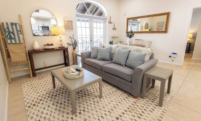 Historic Seaport Apartment | Sandbar Suite | 2 bed/2 bath apartment with patio overlooking Front Street