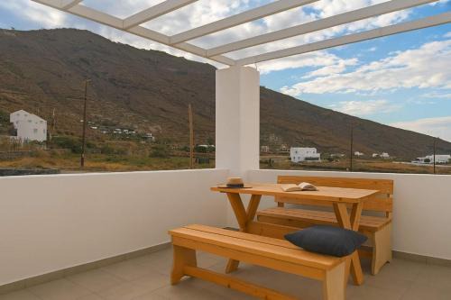 Imerovigli House | Santorini's Old Mill Serene Getaway by Pori Beach