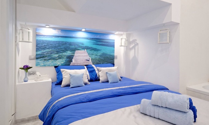 Mousio Hotel | Santorini Style in Athens, Greece