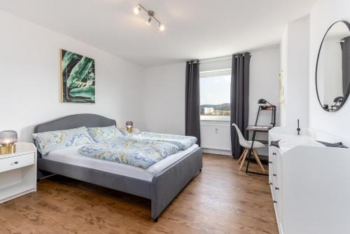 Saarbruecken Apartment | Schicke zentrale Maisonette-Wohnung mit City-View