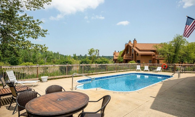 Mancelona Condo | Schuss Village, Fall colors, sleeps 6 condo w/2 bathrooms, wood fireplace