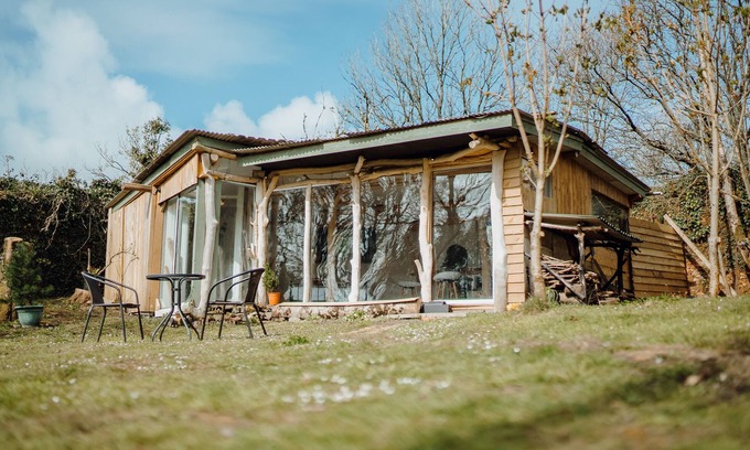 Kilgetty Cabin | Sculpted Log Cabin in the grounds of Begelly House