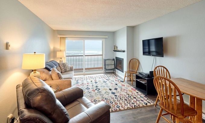 Lincoln City Condo | Sea the Waves - Unobstructed Ocean View! - Cozy with gas fireplace- Sparkling pool!