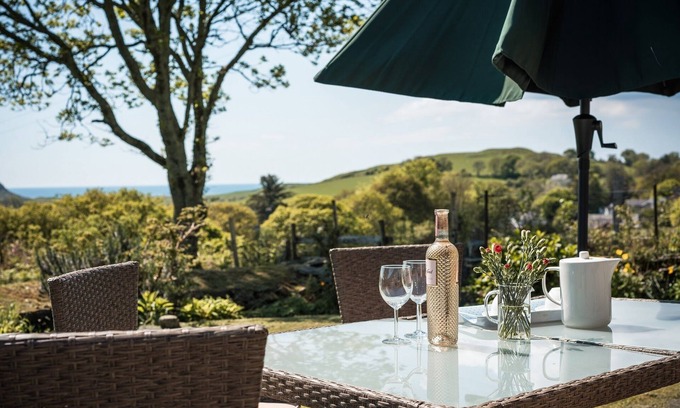 Pentrefelin Cottage | Secluded Luxurious Award Winning 3 Bed Cottage with Sea Views and Walled Gardens