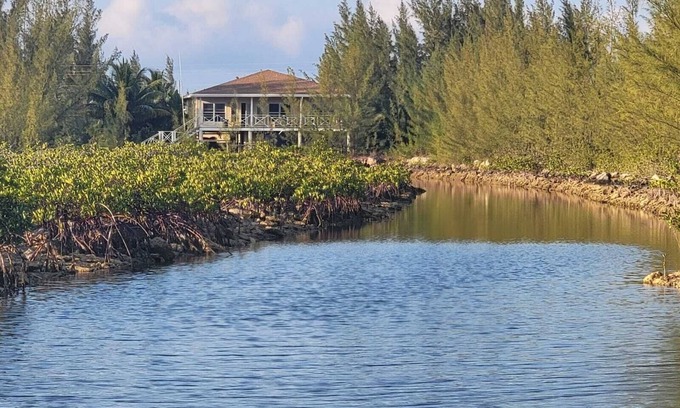 Port Royal House | Secluded, private waterfront 4BR house in Bimini. Includes golf cart, kayak, and stunning views