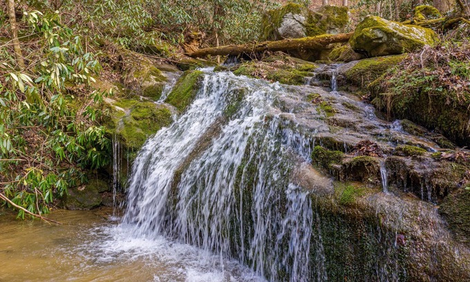 Sevierville Cabin | Secluded Smoky Mountain Cabin with Private Waterfall, Creek, & Luxury Amenities!
