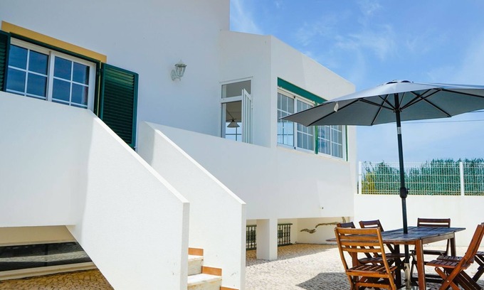 Manta Rota House | Serene Duplex House With Patio by LovelyStay