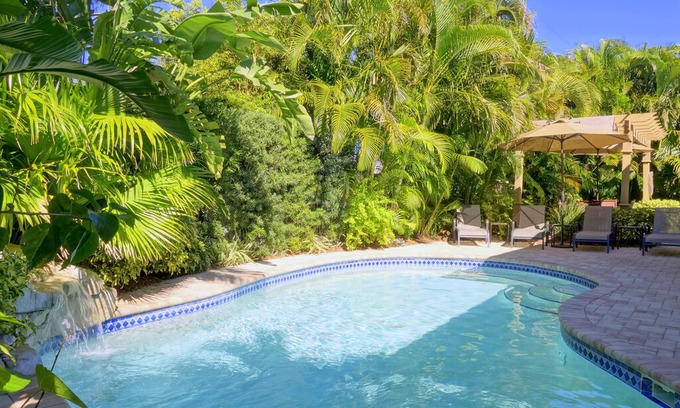 Holmes Beach House | SIMPLY CHIC: Beautiful, Remodeled, Heated Pool, Waterfall, 1.5 Blocks to Beach!!