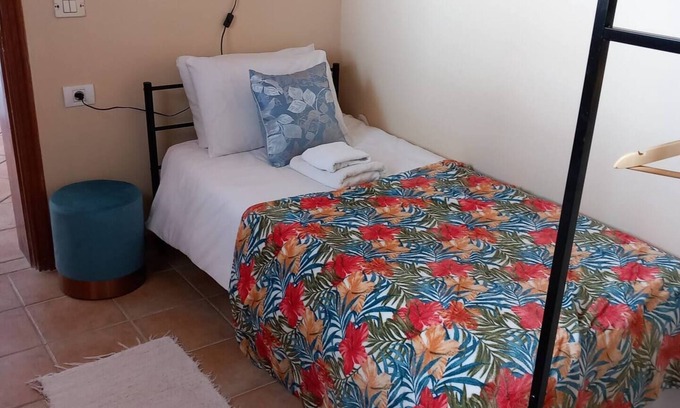 Vilaflor Apartment | Single room with a single bed and en-suite bathroom. The window looks out onto the patio area