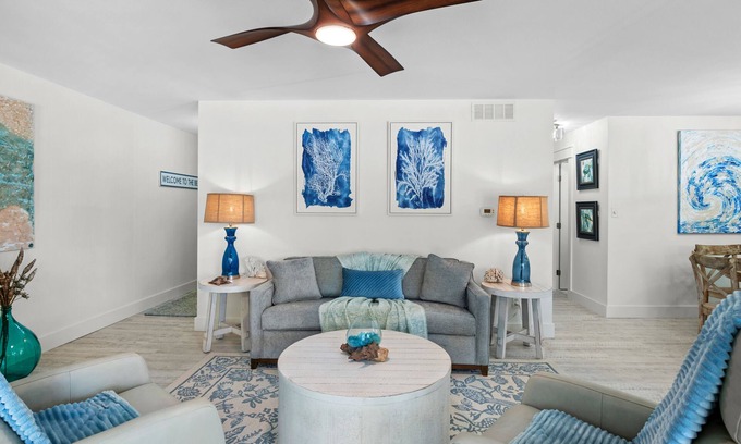 Destin Condo | Sip a glass of wine on our balcony Private Beachfront views pool large courtyard