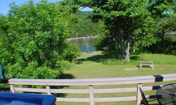 Holiday Island Condo | Six-Person Hot Tub, Lakeside, King Beds, Fireplace!