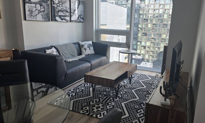 Downtown Montreal Apartment | Skyline 1BR with Pool, Workspace and Fire Lounge