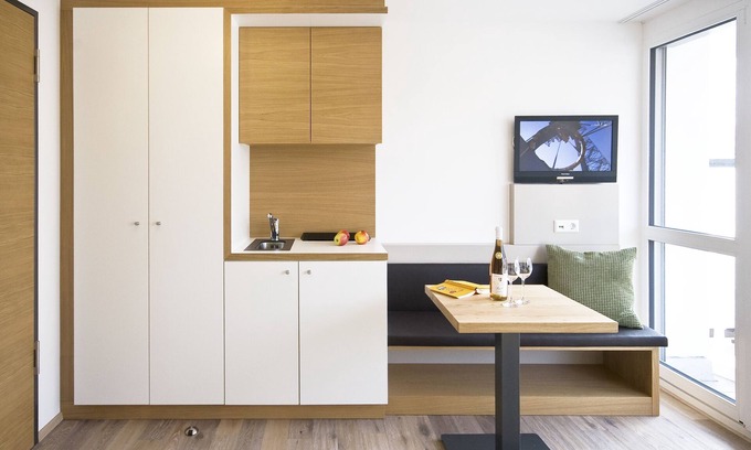 Immenstaad am Bodensee Apartment | Small double room with lake view from the balcony