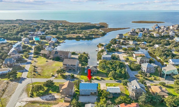 Avon House | Soundside Dog Friendly Home w/Hot Tub, Game Room, Tiki Bar, Screened Porch