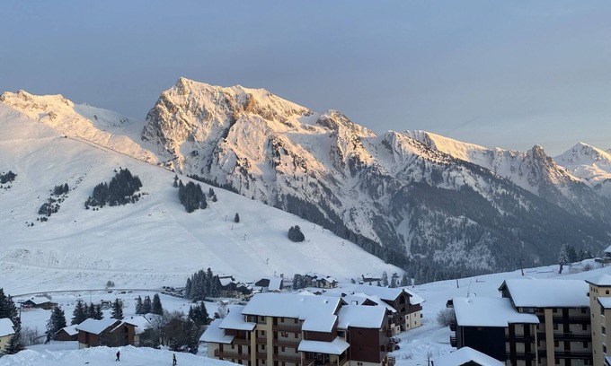 Manigod Apartment | South-facing mountain-view apartment with ski-in, ski-out convenience