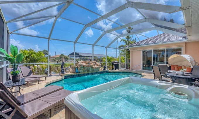 South Gulf Cove House | South Gulf Cove 4 Bedroom Pool + Hot Tub on Canal Private Home