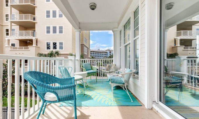 Upper Grand Lagoon Condo | Spacious family condo with large balcony & shared pool and hot tub