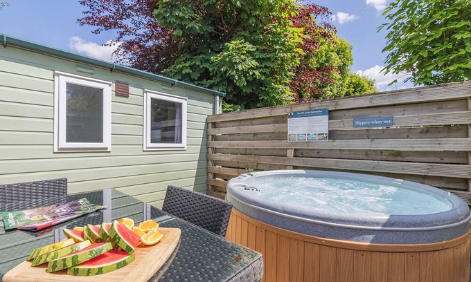 Longnor House | Spacious modern one-bedroom caravan exclusively for two adults with hot tub.