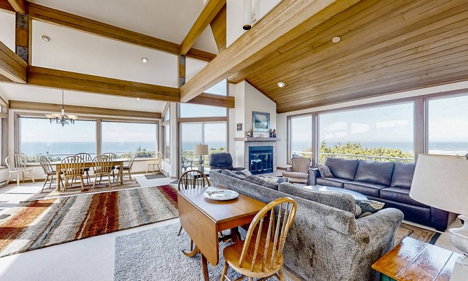 South Beach House | Spacious oceanfront home with free WiFi, fireplace, and wrap-around deck