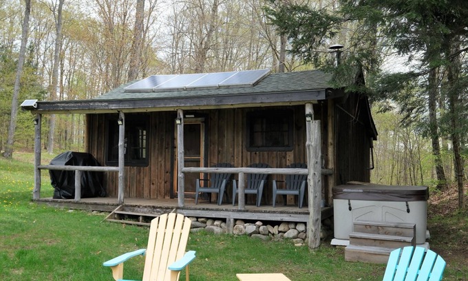 Weslemkoon Cabin | Spacious Rustic Cabin with Pond Views, Lake Access, Hot Tub and Dog-Friendly!