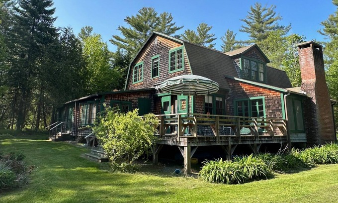 Greensboro House | Spacious, rustic getaway on Caspian Lake with two docks & lawn.
