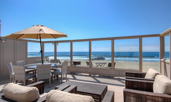 Santa Ana Heights Condo | Spectacular oceanfront upper unit with amazing views from awesome roof top deck!