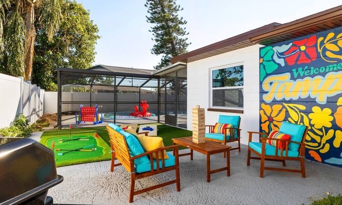 Tampa House | Stadium Splash! Walk to Ray Jay, Private Pool, Games, Putting Green & More – Perfect Tampa Stay!